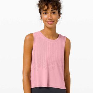 Three Blue, Pink and Black Lululemon Train to Be Tank Tops